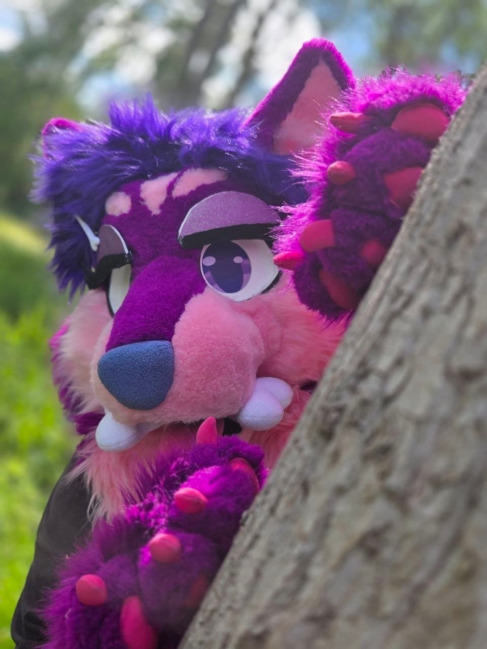 Purple fox fursuiter at an MK Critters meet